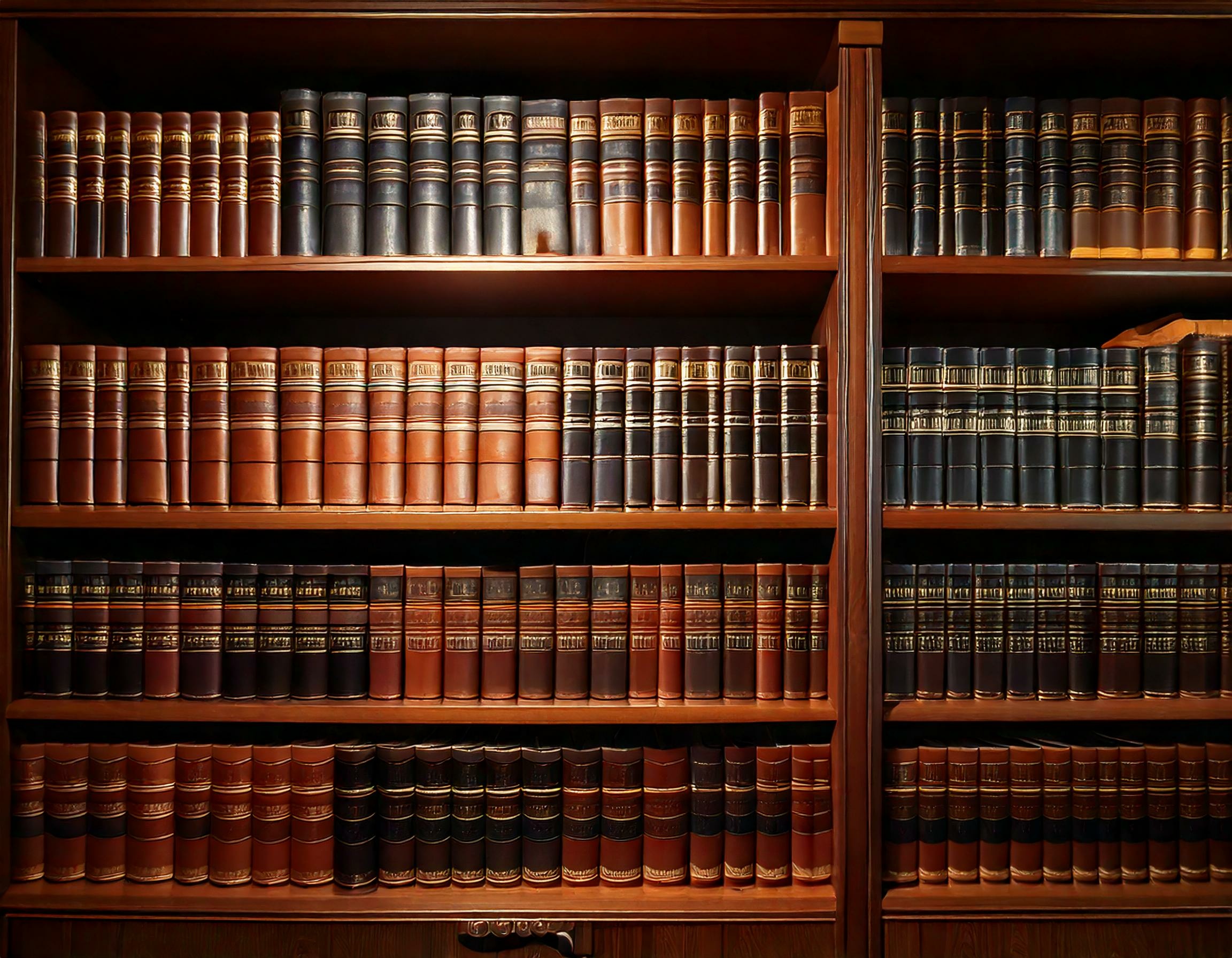 An Organized Bookshelf Filled With Law Books And Legal Reference Materials